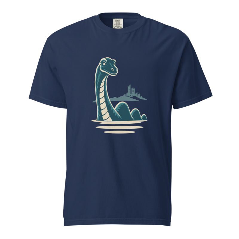 Teal Loch Ness Monster rising from the loch with Urquhart Castle on the shore behind, printed on a true navy heavyweight tee.