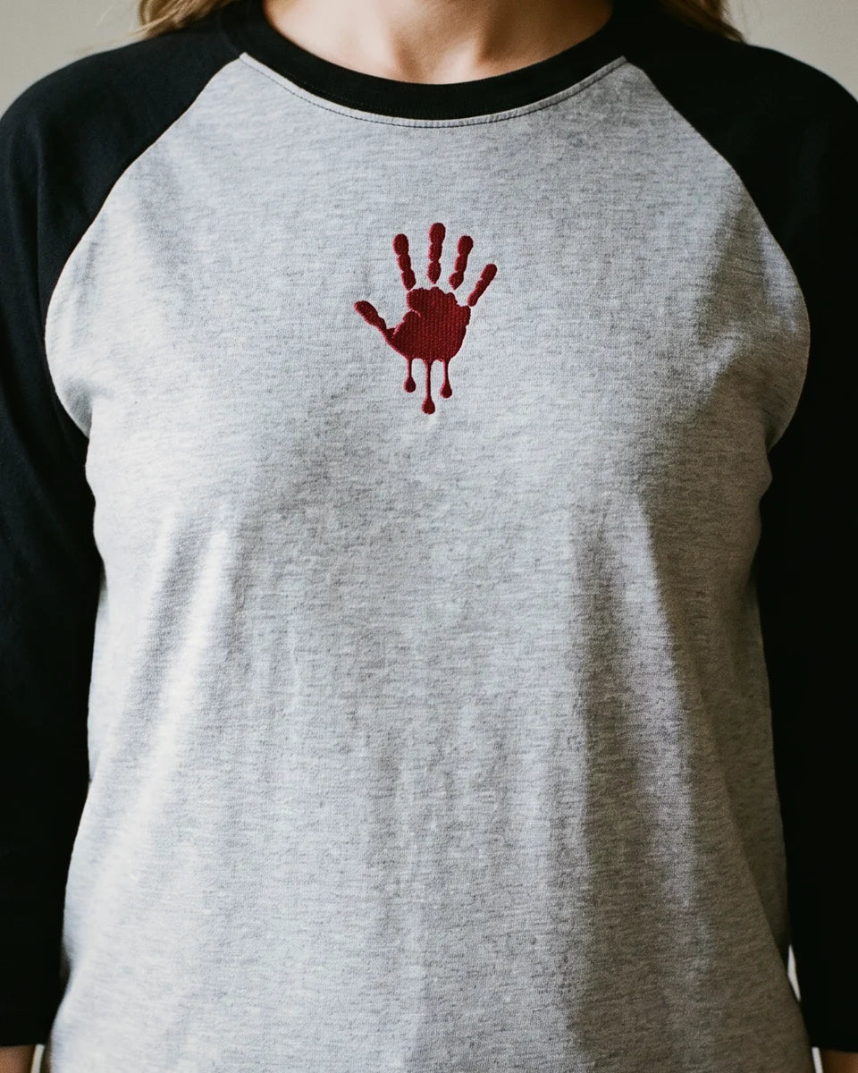 Bloody Hand Raglan, Heather Grey/Black, worn, torso view, embroidered bloody hand
