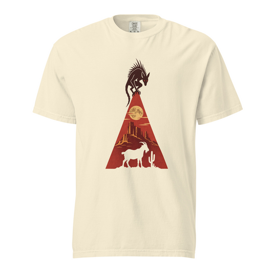 Spined chupacabra with red eyes crouched over a red desert scene with a goat and a full moon, printed on an ivory heavyweight tee.