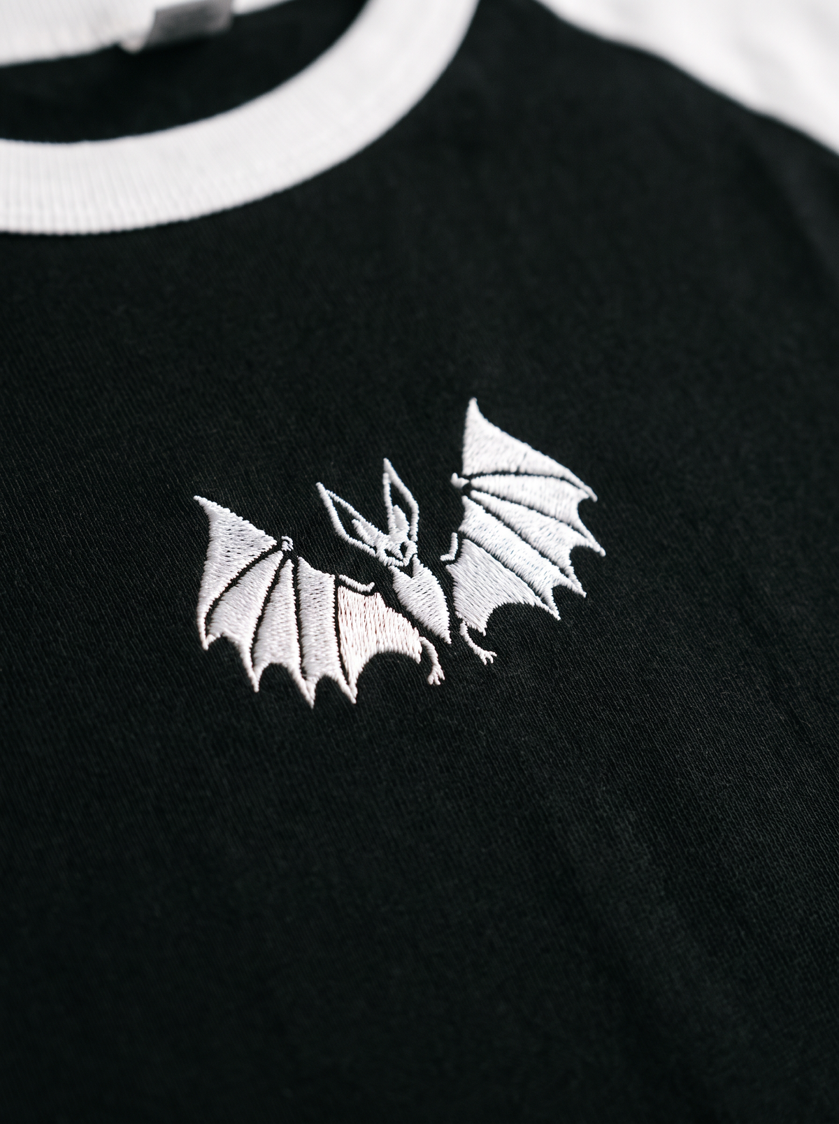 Vampire Bat Raglan, Black/White, embroidered bat on Tultex 245 raglan