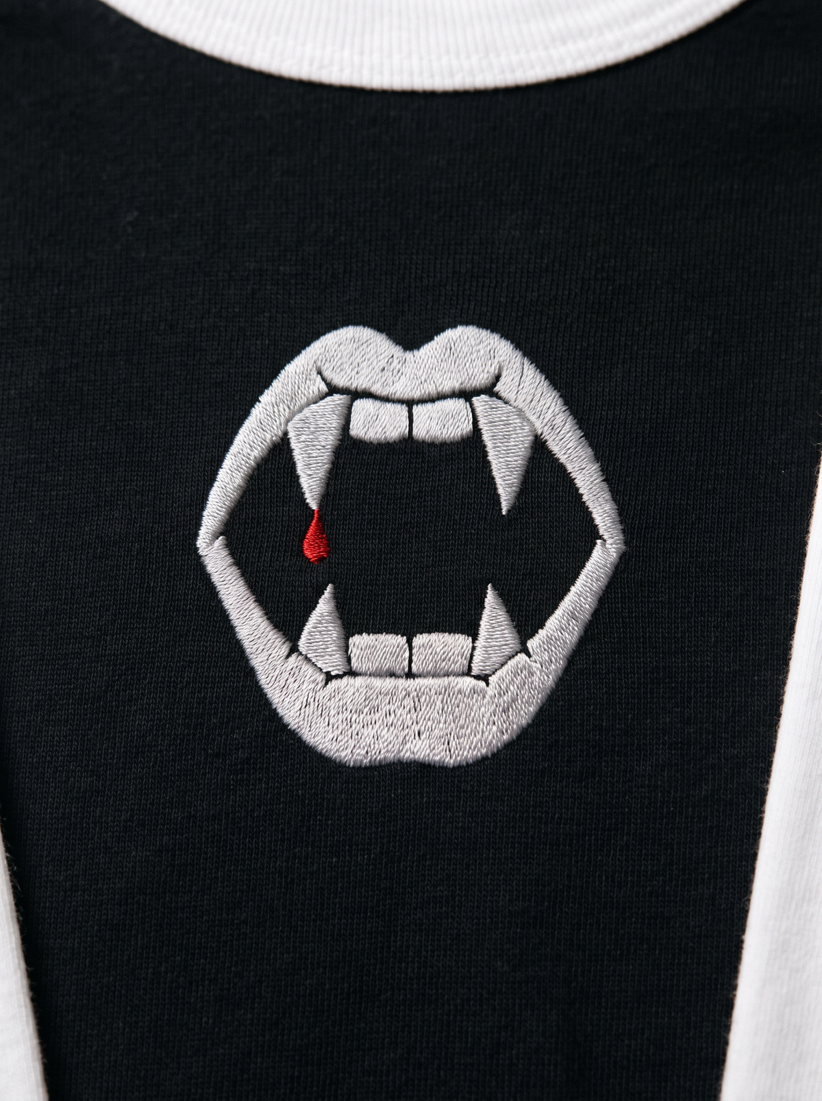 Fangs Raglan, Black/White, embroidered fangs on Tultex 245 raglan