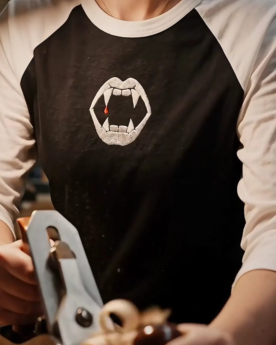 Fangs Raglan, Black/White, worn, torso view, embroidered fangs