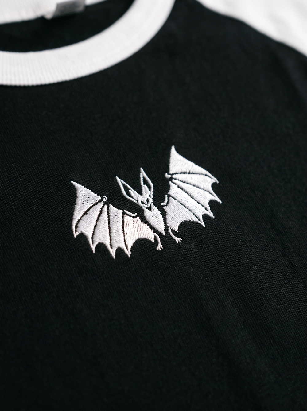 Vampire Bat Raglan, Black/White, embroidered bat on Tultex 245 raglan