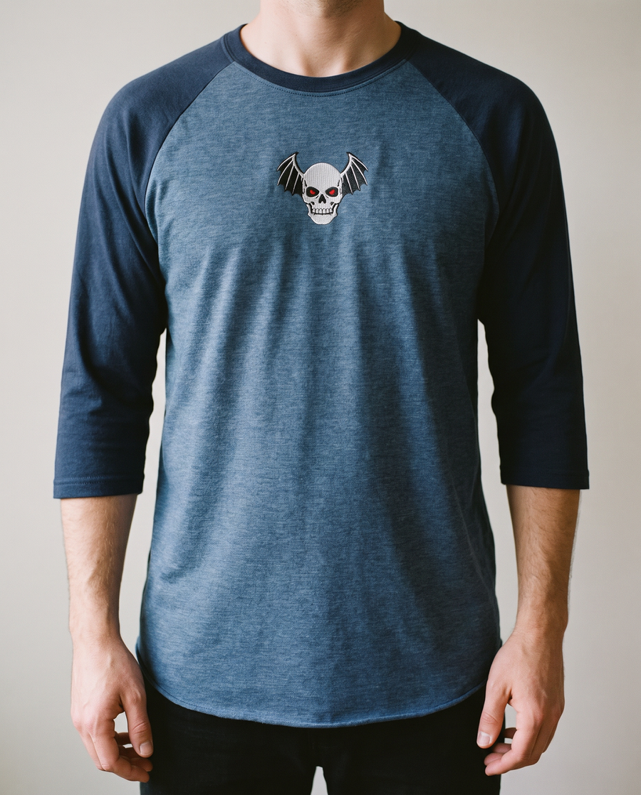 Winged Skull Raglan, Heather Denim/Navy, worn, chest detail, embroidered winged skull on Tultex 245 raglan