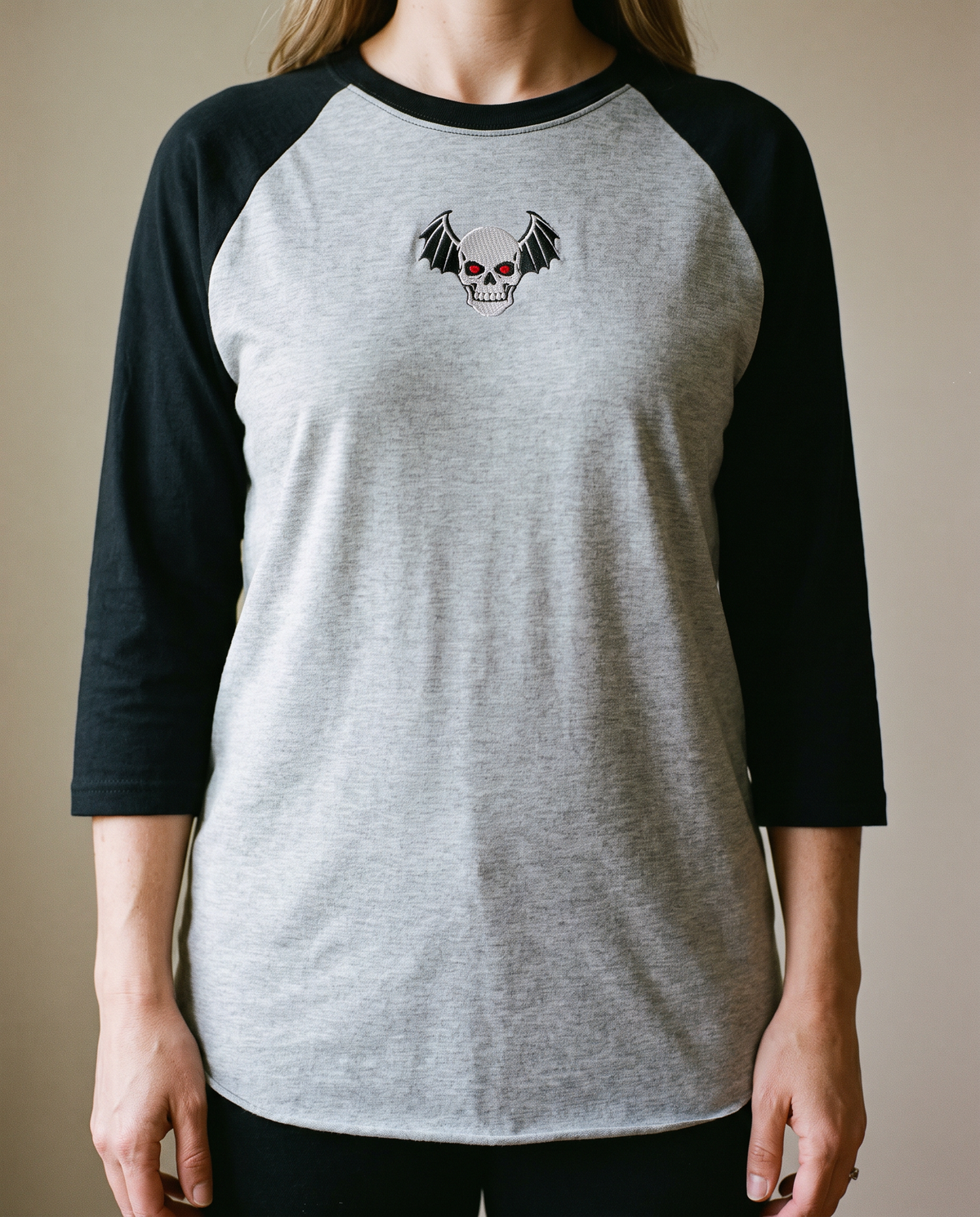 Winged Skull Raglan, Heather Grey/Black, worn, chest detail, embroidered winged skull on Tultex 245 raglan